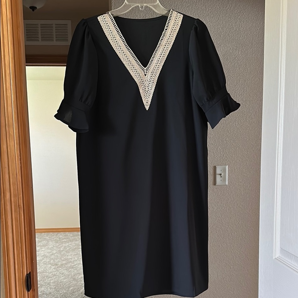 Elegant Black Dress with Lace Detail
